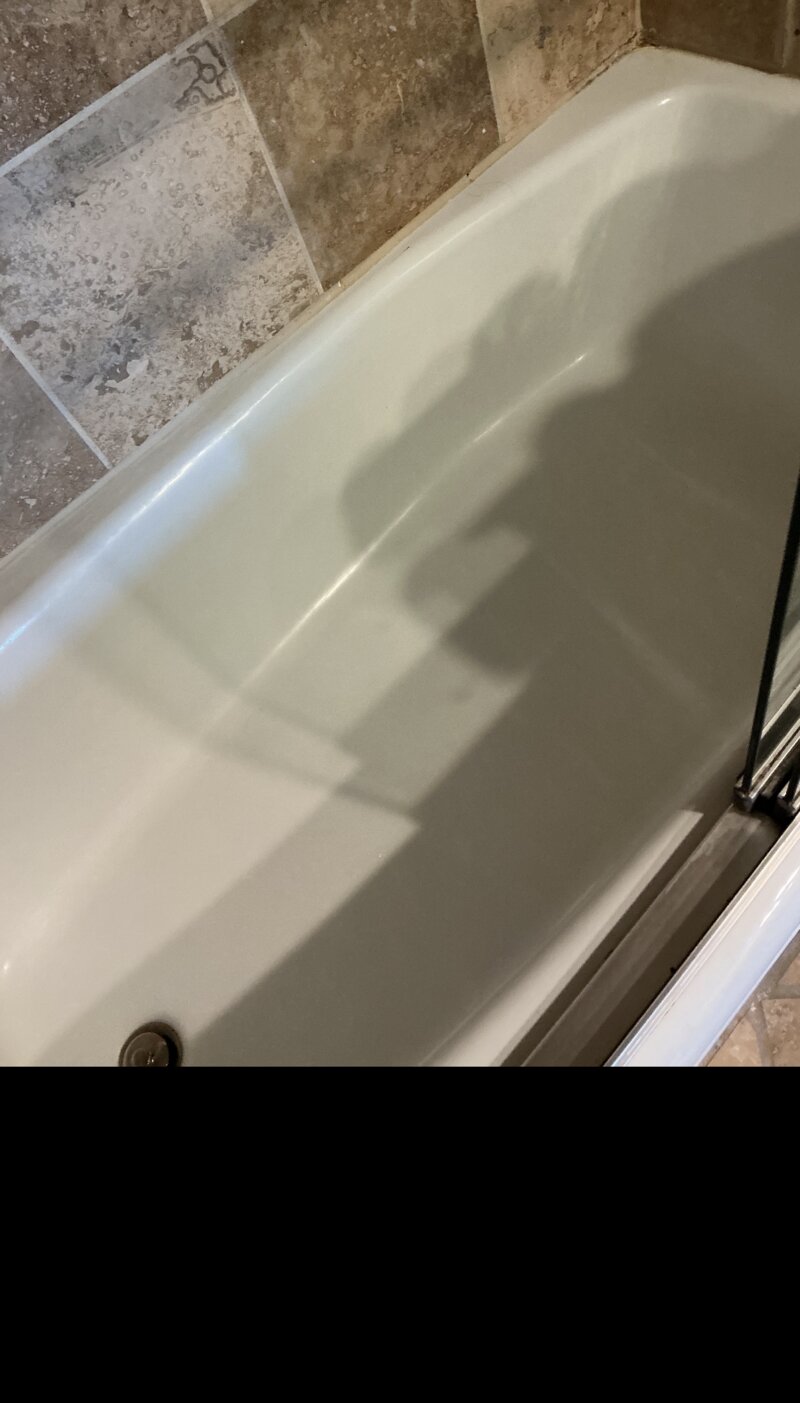 Bathtub after cleaning — bright spotless white