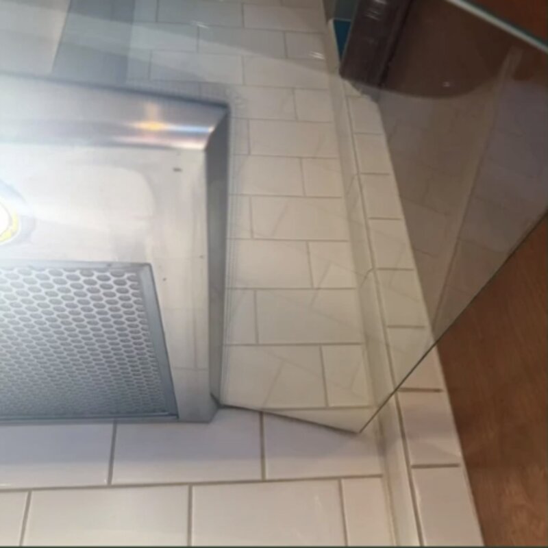 Stove hood after cleaning — polished and grease-free